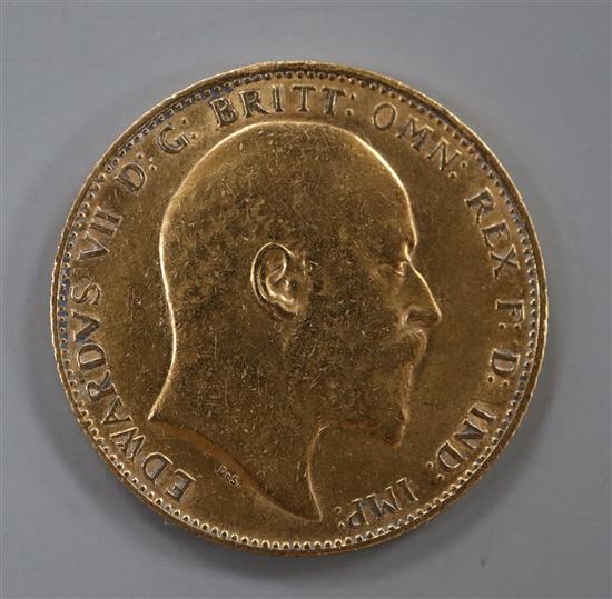 An Edward VII 1909 gold full sovereign.